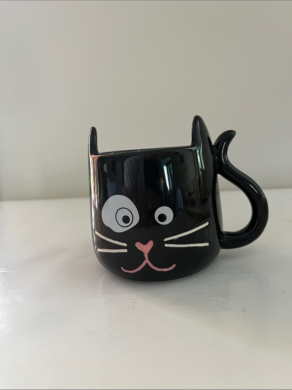 Kitty Face Mug “Think Outside The Litter Box” in black/white